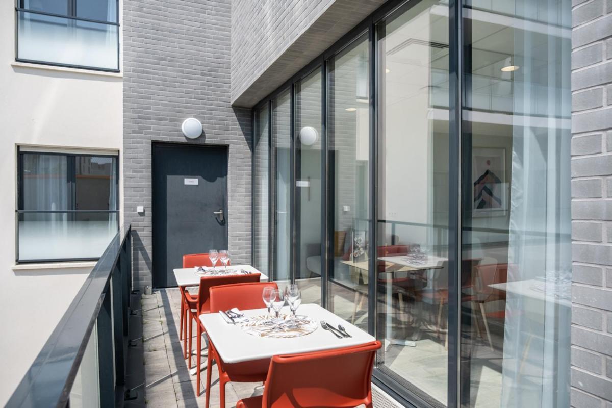 Aparthotel Oh Activ Cergy Esterno foto